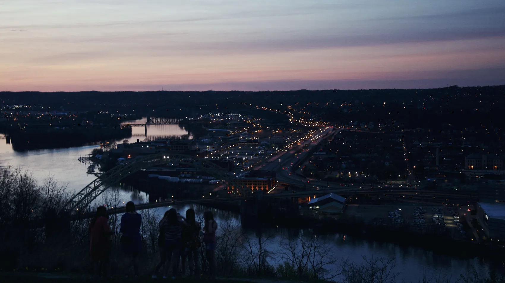 Pittsburgh rivers and city lights from an evening overlook.